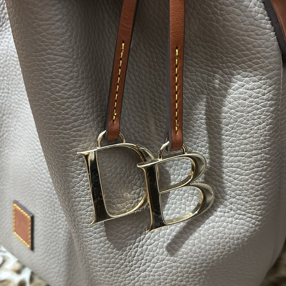 Dooney and Burke Barlow Bag. Taupe with brown trim. Very good condition. - Picture 2 of 16